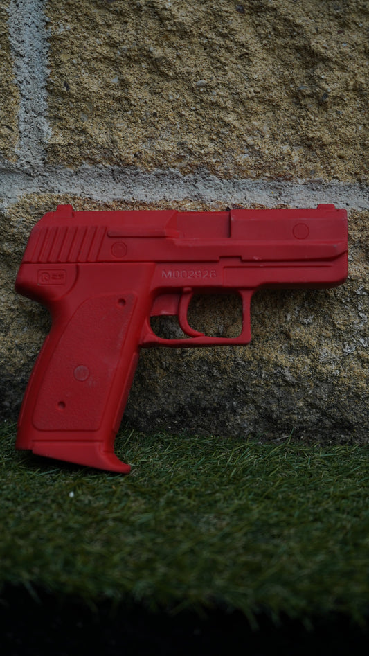 Pistola táctica de entrenamiento K25 roja